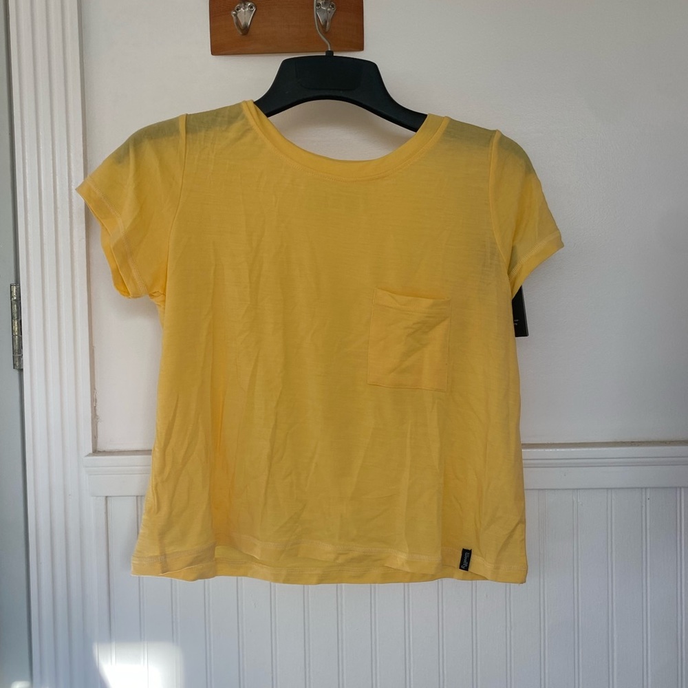 Yellow shirt with front pocket, size small, brand new